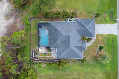 Nestled in the community of Rotonda West, this exquisite on Rotonda Golf and Country Club - Long Marsh  in Florida - for sale on GolfHomes.com, golf home, golf lot