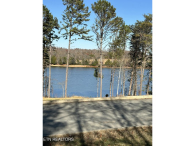 Come build your dream home on this beautiful lake view lot in on Rarity Bay Country Club - Loudon in Tennessee - for sale on GolfHomes.com, golf home, golf lot