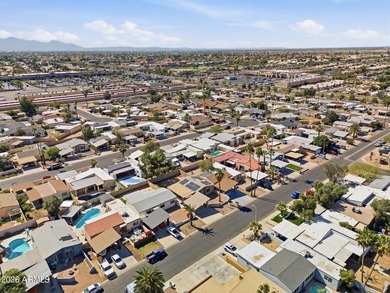 Seller providing $5,000 towards buyers closing costs. Move in on Villa De Paz Golf Course in Arizona - for sale on GolfHomes.com, golf home, golf lot