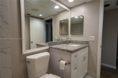 Spacious 2 bedroom 2 bath with large ENCLOSED BALCONY , storage on Flamingo Lakes Country Club in Florida - for sale on GolfHomes.com, golf home, golf lot
