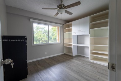 Spacious 2 bedroom 2 bath with large ENCLOSED BALCONY , storage on Flamingo Lakes Country Club in Florida - for sale on GolfHomes.com, golf home, golf lot