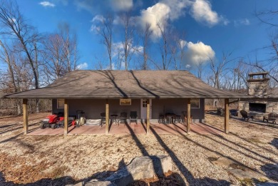 Located just 1.8 miles from the pristine waters of Bull Shoals on Lost Woods Golf Course in Missouri - for sale on GolfHomes.com, golf home, golf lot