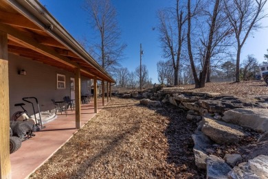 Located just 1.8 miles from the pristine waters of Bull Shoals on Lost Woods Golf Course in Missouri - for sale on GolfHomes.com, golf home, golf lot