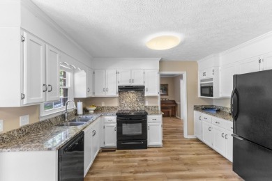 Welcome to 122 Englewood Rd, a beautifully maintained 4-bedroom on Houndslake Country Club in South Carolina - for sale on GolfHomes.com, golf home, golf lot