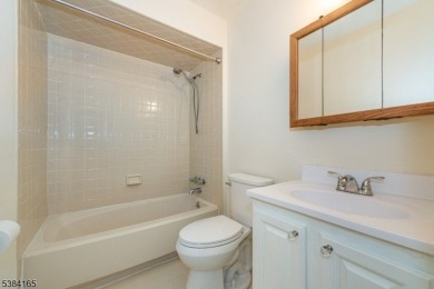 Fresh and clean END unit and ready for you to move right in! on Minerals Golf Club in New Jersey - for sale on GolfHomes.com, golf home, golf lot