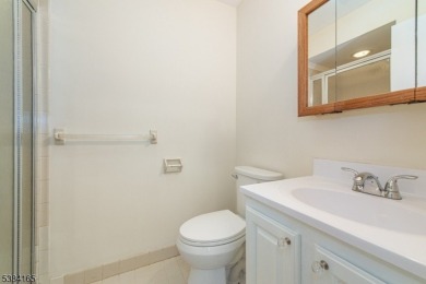 Fresh and clean END unit and ready for you to move right in! on Minerals Golf Club in New Jersey - for sale on GolfHomes.com, golf home, golf lot