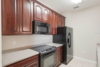 One or more photo(s) has been virtually staged. One or more on ChampionsGate Golf Resort in Florida - for sale on GolfHomes.com, golf home, golf lot