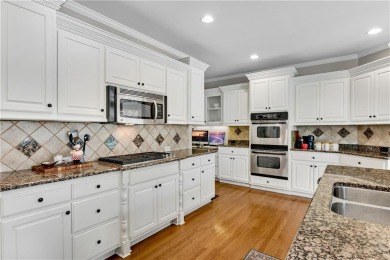 Welcome to this stunning 6BR/5BA, 3-sides brick home in the on Windermere Golf Club in Georgia - for sale on GolfHomes.com, golf home, golf lot