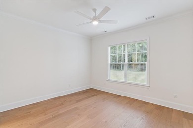 This thoughtfully designed home offers the ease of one-level on Oak Grove Island Golf and Country Club in Georgia - for sale on GolfHomes.com, golf home, golf lot