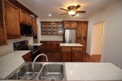 FRESH PAINT throughout! NEW APPLIANCES! MOVE-IN READY! Beautiful on Laurel Country Club in Mississippi - for sale on GolfHomes.com, golf home, golf lot