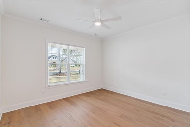 This thoughtfully designed home offers the ease of one-level on Oak Grove Island Golf and Country Club in Georgia - for sale on GolfHomes.com, golf home, golf lot