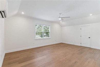 This thoughtfully designed home offers the ease of one-level on Oak Grove Island Golf and Country Club in Georgia - for sale on GolfHomes.com, golf home, golf lot