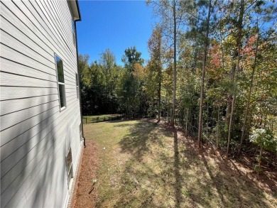2 Beautiful Story on a BASEMENT with a courtyard entry in resort on Traditions of Braselton Golf Club in Georgia - for sale on GolfHomes.com, golf home, golf lot