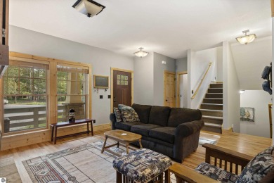 Experience year-round comfort and elegance in this like-new on Crystal Mountain Golf Course in Michigan - for sale on GolfHomes.com, golf home, golf lot