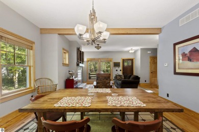 Experience year-round comfort and elegance in this like-new on Crystal Mountain Golf Course in Michigan - for sale on GolfHomes.com, golf home, golf lot