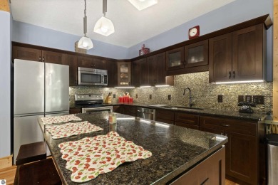 Experience year-round comfort and elegance in this like-new on Crystal Mountain Golf Course in Michigan - for sale on GolfHomes.com, golf home, golf lot