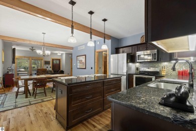 Experience year-round comfort and elegance in this like-new on Crystal Mountain Golf Course in Michigan - for sale on GolfHomes.com, golf home, golf lot