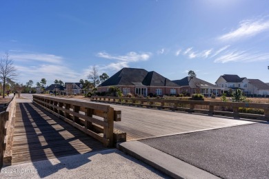 Step into luxury coastal living at its finest in this on Compass Pointe Golf Course in North Carolina - for sale on GolfHomes.com, golf home, golf lot