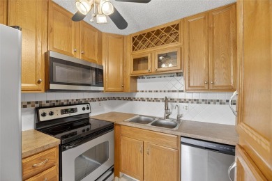 Spacious 2BR + Den + Office in 55+ Triplex - Middle Unit with on Sandpiper Golf Club in Florida - for sale on GolfHomes.com, golf home, golf lot