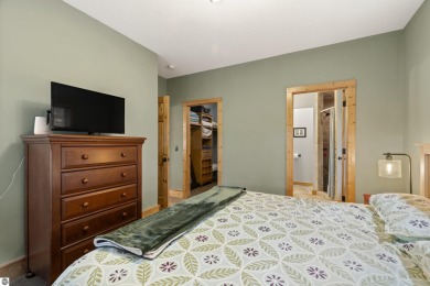 Experience year-round comfort and elegance in this like-new on Crystal Mountain Golf Course in Michigan - for sale on GolfHomes.com, golf home, golf lot