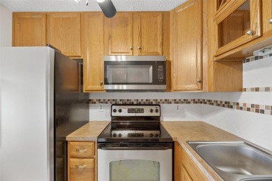 Spacious 2BR + Den + Office in 55+ Triplex - Middle Unit with on Sandpiper Golf Club in Florida - for sale on GolfHomes.com, golf home, golf lot