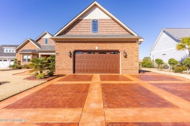 Step into luxury coastal living at its finest in this on Compass Pointe Golf Course in North Carolina - for sale on GolfHomes.com, golf home, golf lot