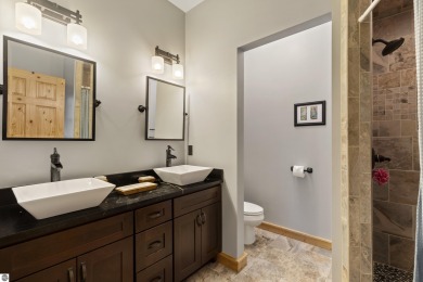 Experience year-round comfort and elegance in this like-new on Crystal Mountain Golf Course in Michigan - for sale on GolfHomes.com, golf home, golf lot