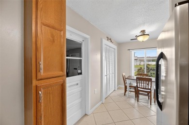 Spacious 2BR + Den + Office in 55+ Triplex - Middle Unit with on Sandpiper Golf Club in Florida - for sale on GolfHomes.com, golf home, golf lot