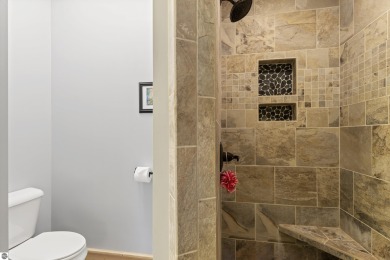 Experience year-round comfort and elegance in this like-new on Crystal Mountain Golf Course in Michigan - for sale on GolfHomes.com, golf home, golf lot
