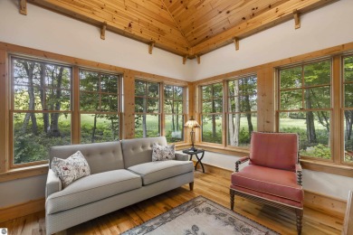 Experience year-round comfort and elegance in this like-new on Crystal Mountain Golf Course in Michigan - for sale on GolfHomes.com, golf home, golf lot