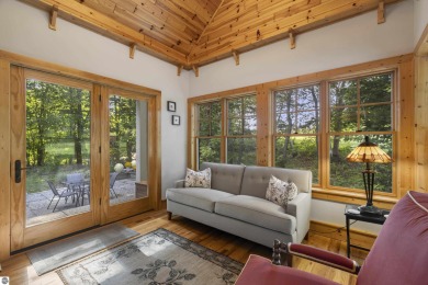 Experience year-round comfort and elegance in this like-new on Crystal Mountain Golf Course in Michigan - for sale on GolfHomes.com, golf home, golf lot