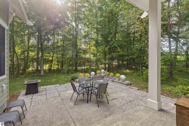 Experience year-round comfort and elegance in this like-new on Crystal Mountain Golf Course in Michigan - for sale on GolfHomes.com, golf home, golf lot