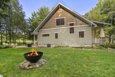 Experience year-round comfort and elegance in this like-new on Crystal Mountain Golf Course in Michigan - for sale on GolfHomes.com, golf home, golf lot