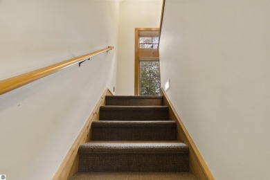 Experience year-round comfort and elegance in this like-new on Crystal Mountain Golf Course in Michigan - for sale on GolfHomes.com, golf home, golf lot