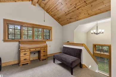 Experience year-round comfort and elegance in this like-new on Crystal Mountain Golf Course in Michigan - for sale on GolfHomes.com, golf home, golf lot
