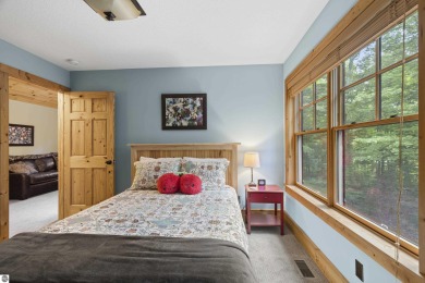 Experience year-round comfort and elegance in this like-new on Crystal Mountain Golf Course in Michigan - for sale on GolfHomes.com, golf home, golf lot