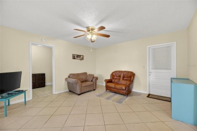 Spacious 2BR + Den + Office in 55+ Triplex - Middle Unit with on Sandpiper Golf Club in Florida - for sale on GolfHomes.com, golf home, golf lot