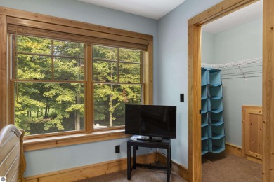 Experience year-round comfort and elegance in this like-new on Crystal Mountain Golf Course in Michigan - for sale on GolfHomes.com, golf home, golf lot