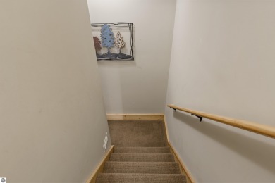 Experience year-round comfort and elegance in this like-new on Crystal Mountain Golf Course in Michigan - for sale on GolfHomes.com, golf home, golf lot