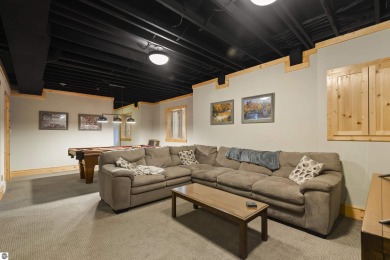 Experience year-round comfort and elegance in this like-new on Crystal Mountain Golf Course in Michigan - for sale on GolfHomes.com, golf home, golf lot
