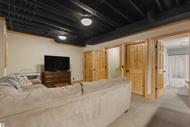 Experience year-round comfort and elegance in this like-new on Crystal Mountain Golf Course in Michigan - for sale on GolfHomes.com, golf home, golf lot