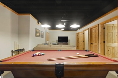 Experience year-round comfort and elegance in this like-new on Crystal Mountain Golf Course in Michigan - for sale on GolfHomes.com, golf home, golf lot