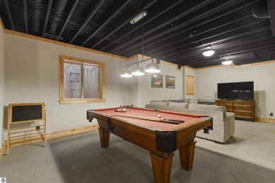 Experience year-round comfort and elegance in this like-new on Crystal Mountain Golf Course in Michigan - for sale on GolfHomes.com, golf home, golf lot