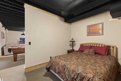 Experience year-round comfort and elegance in this like-new on Crystal Mountain Golf Course in Michigan - for sale on GolfHomes.com, golf home, golf lot