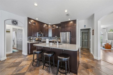 Welcome to this move-in ready 5 bedroom + bonus room, 4 bathroom on Heritage Harbor Golf and Country Club in Florida - for sale on GolfHomes.com, golf home, golf lot