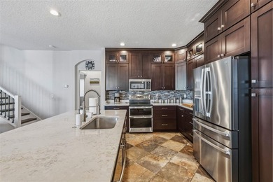 Welcome to this move-in ready 5 bedroom + bonus room, 4 bathroom on Heritage Harbor Golf and Country Club in Florida - for sale on GolfHomes.com, golf home, golf lot