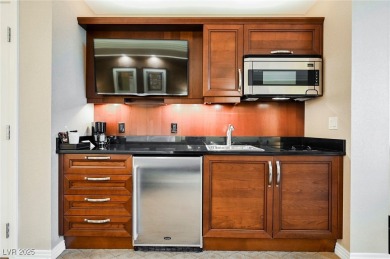 Panoramic Strip facing suite showcasing an amazing view of the on  in Nevada - for sale on GolfHomes.com, golf home, golf lot