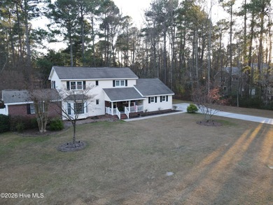 Welcome to this beautifully updated home offering a spectacular on Scotch Meadows Country Club in North Carolina - for sale on GolfHomes.com, golf home, golf lot