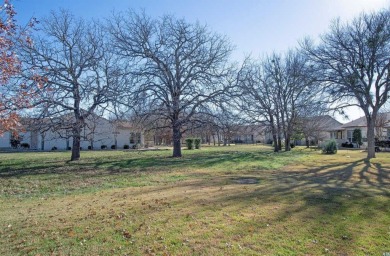 Welcome to 205 Monarch Trail, where comfort meets convenience in on Cowan Creek Golf Course in Texas - for sale on GolfHomes.com, golf home, golf lot