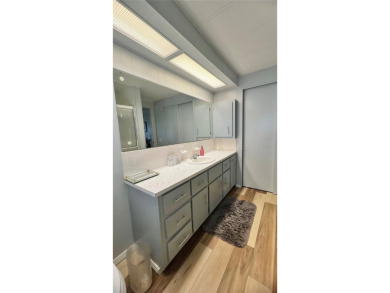 Welcome to this beautifully updated and fully furnished on Fairway Village Golf Course in Florida - for sale on GolfHomes.com, golf home, golf lot